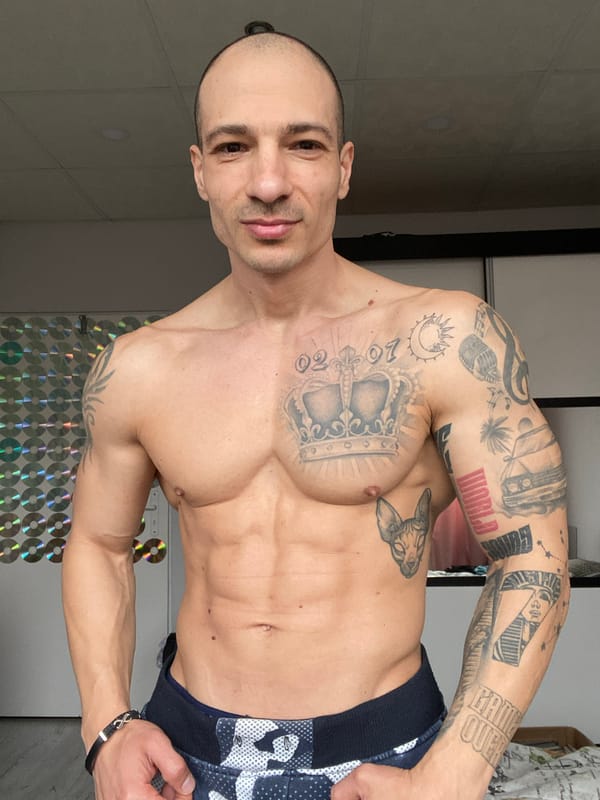 Tattooed man poses for photos in Pleven apartment