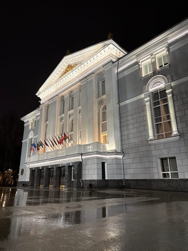 Classical white building photographed at night in Perm