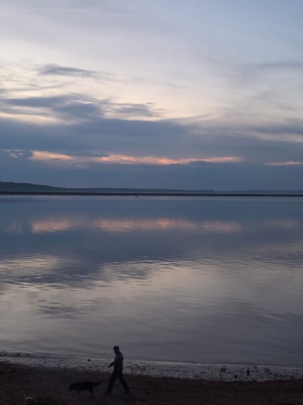 Evening waterfront moments captured in Chaikovsky, Russia