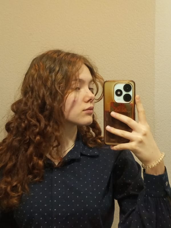 Women take indoor selfies in Chaikovsky, Russia early morning