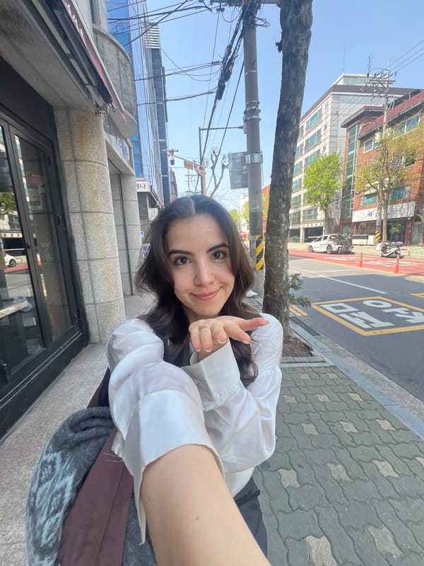 Woman takes peace sign selfie in Seoul