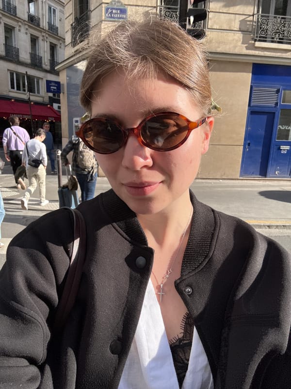 Tourist documents afternoon stroll through central Paris architecture