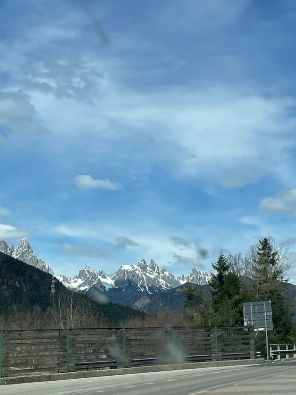 Snow-capped mountain landscape documented in Caralte, Italy