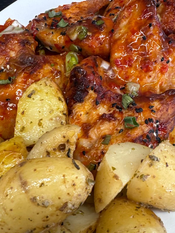 Glazed chicken wings and roasted potatoes, Athens