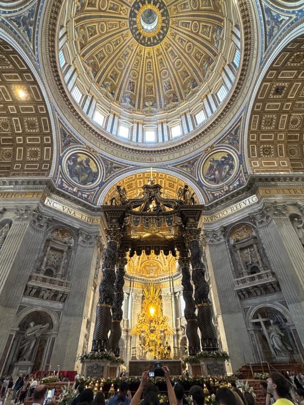 Visitor captures upward view of St. Peter's Basilica interior