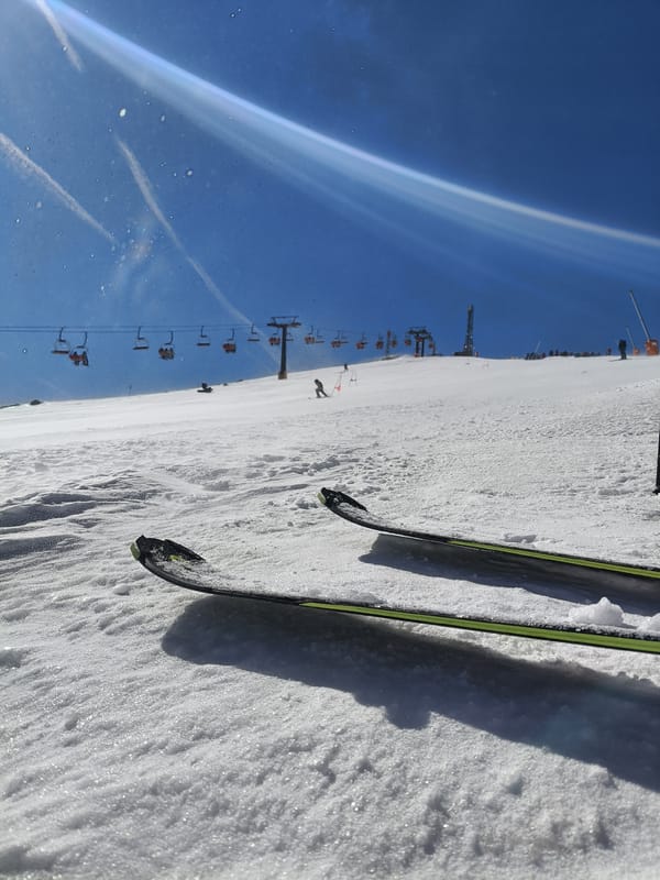 Skis photographed on sunny slopes at Pyrenees resort