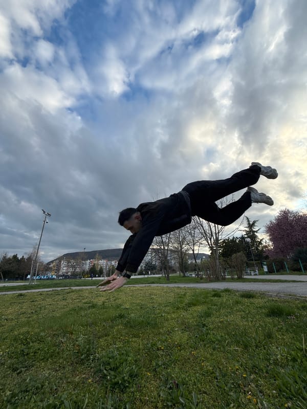 Skateboarders perform tricks at graffiti-covered park in Shumen, Bulgaria