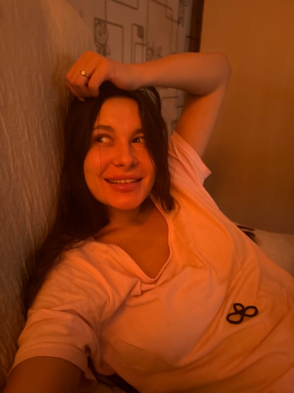 Woman rests on sofa in Russian home