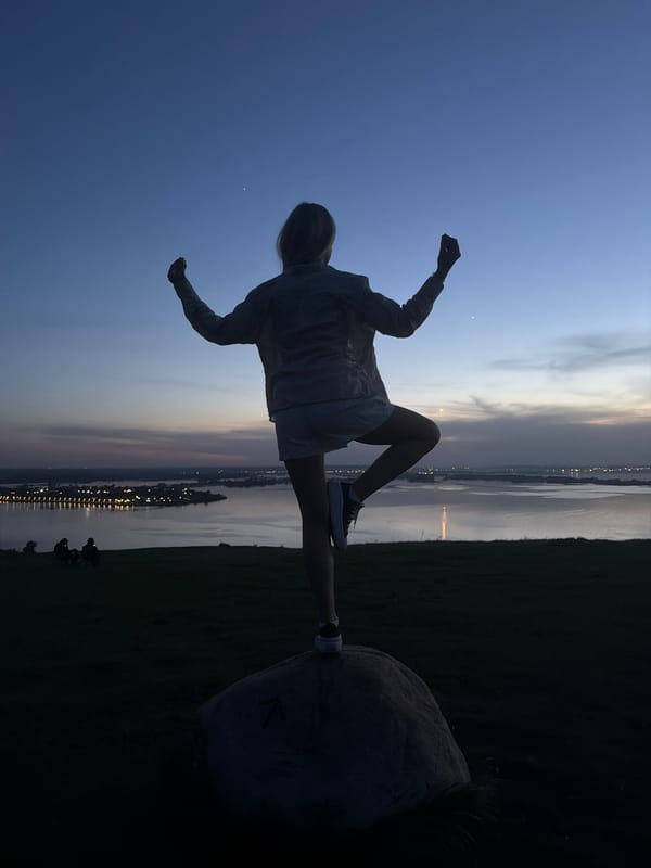Person enjoys twilight waterfront view in Innopolis, Russia