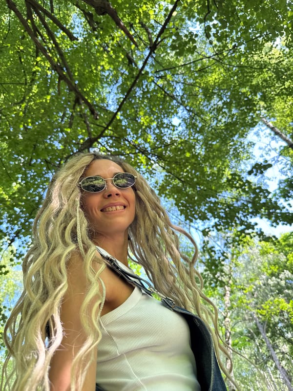 Woman takes selfies in park in Rusanovo, Russia