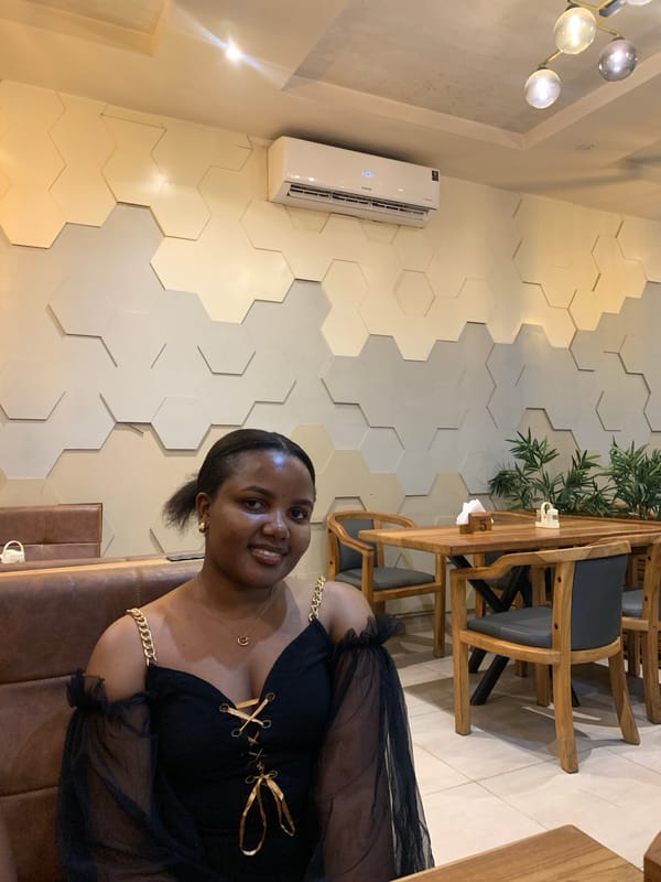 Women photographed at Dar es Salaam cafe during evening social gathering