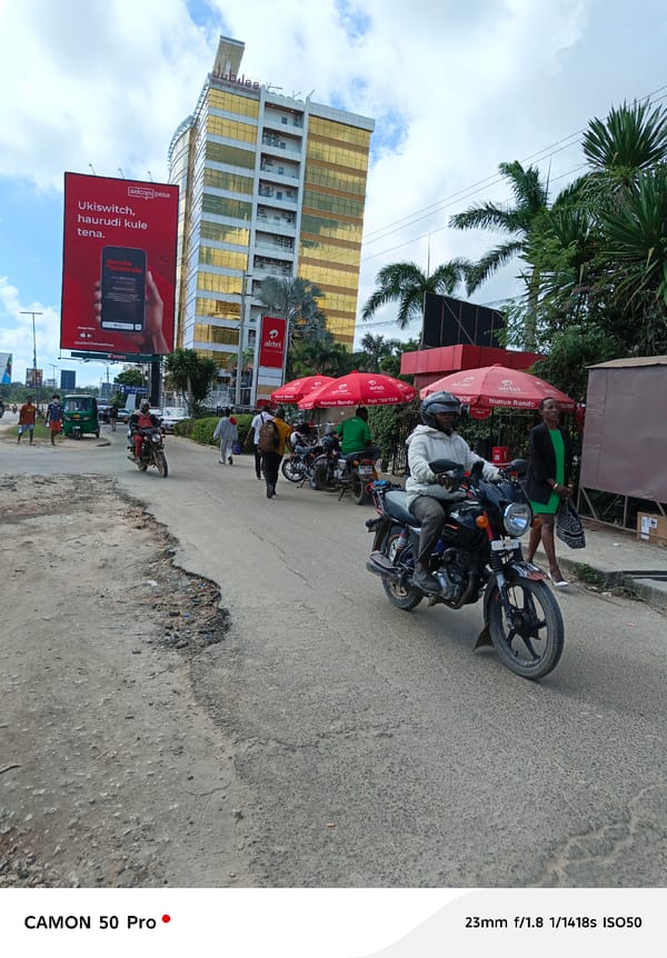 Morning motorcycle ride through Dar es Salaam streets