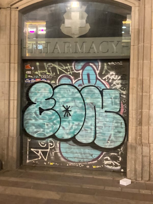 Barcelona alleyways after dark, wall-to-wall street art