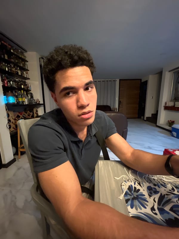 Man plays Parcheesi board game in early morning hours