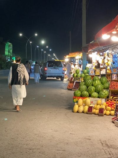 Night market bustles with fruit vendors in Kandahar