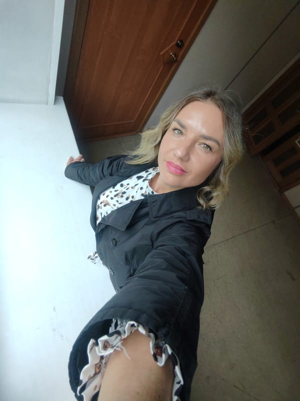 Woman in black coat spotted indoors in Petropavlovsk-Kamchatsky