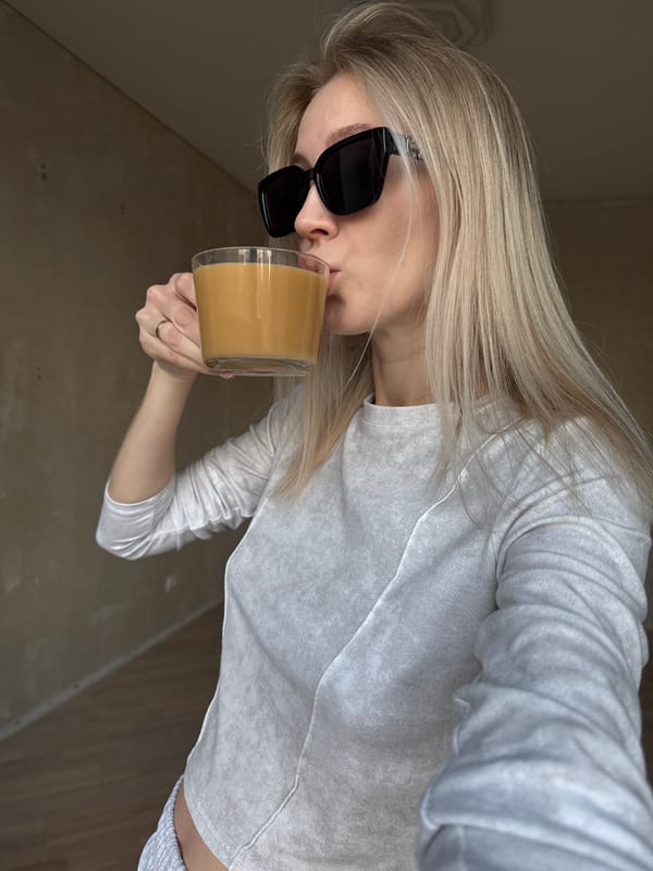 Woman's late-night casual moments with cat in Izhevsk