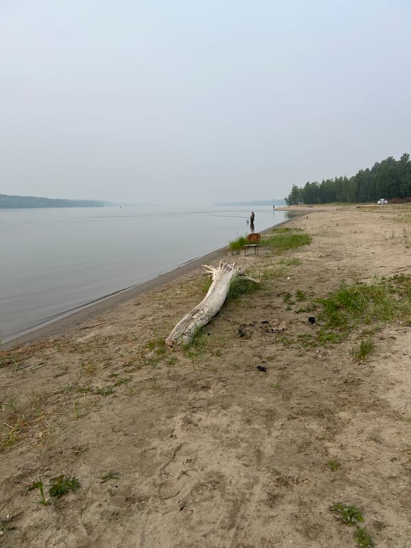 Midsummer night on a Russian riverbank: fishing, fire, and haze