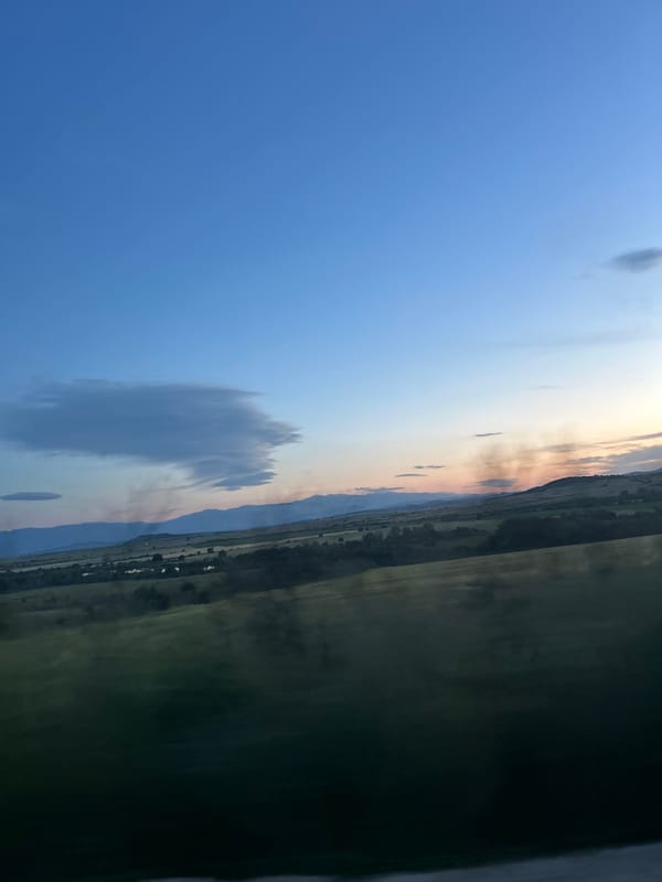 Sunset displays colorful sky transition over Smilets, Bulgaria
