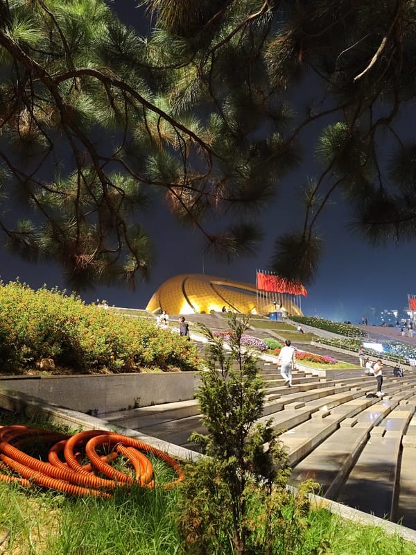 Nighttime scenes around illuminated Xuan Huong Lake in Da Lat