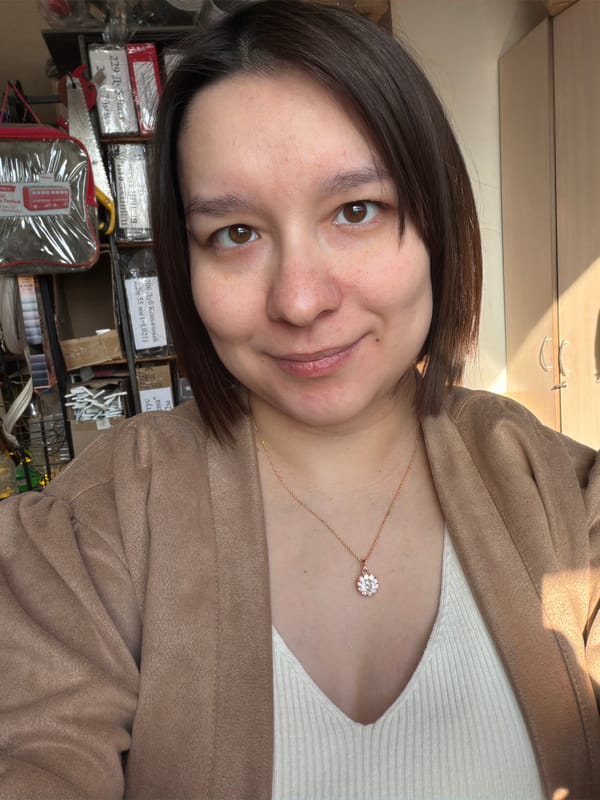 Woman takes selfie in indoor setting in Kozlovka