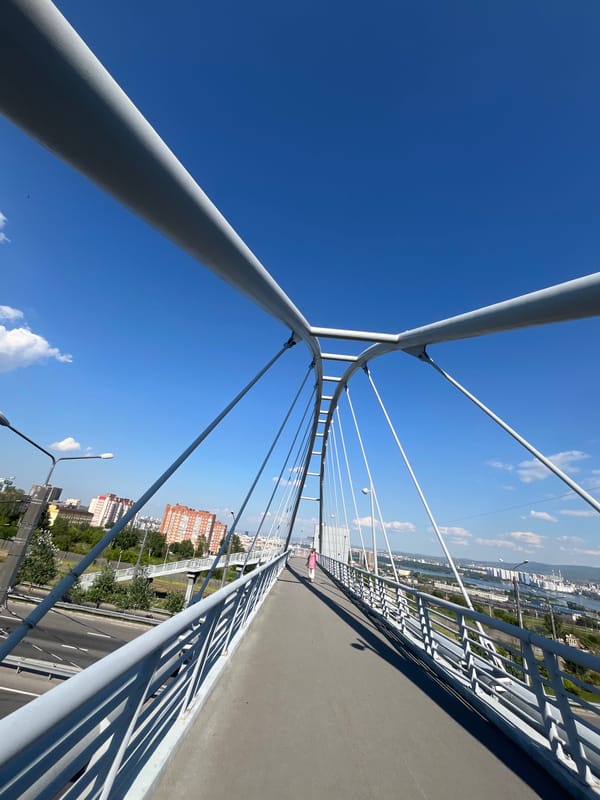 Krasnoyarsk in flux: bridge views and active urban redevelopment