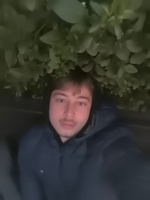 Young man captures casual selfies across Sofia locations