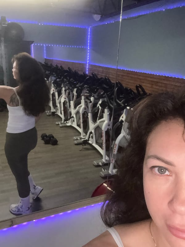 Mirror selfie at a Key West gym, two angles.