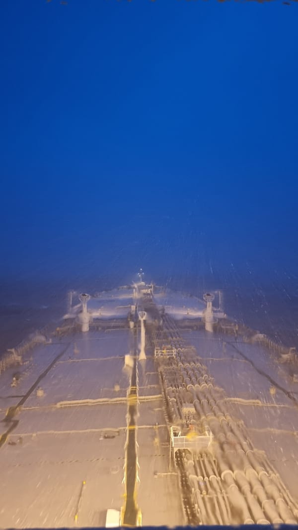 Oil tanker pushes through stormy seas off Sri Lanka at night