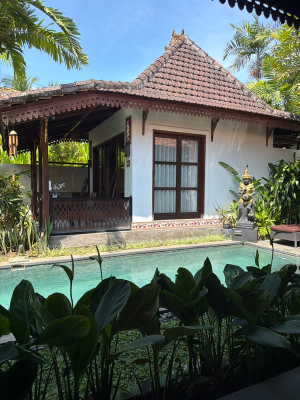 Tourist documents early morning visit to Bali villa resort