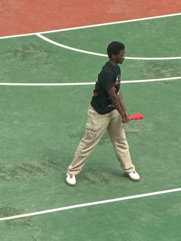 Early morning sports court activity in Beijing's Daxing District