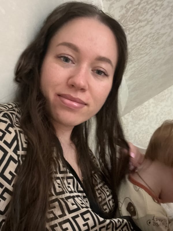 Woman and toddler share quiet moment together in Russia