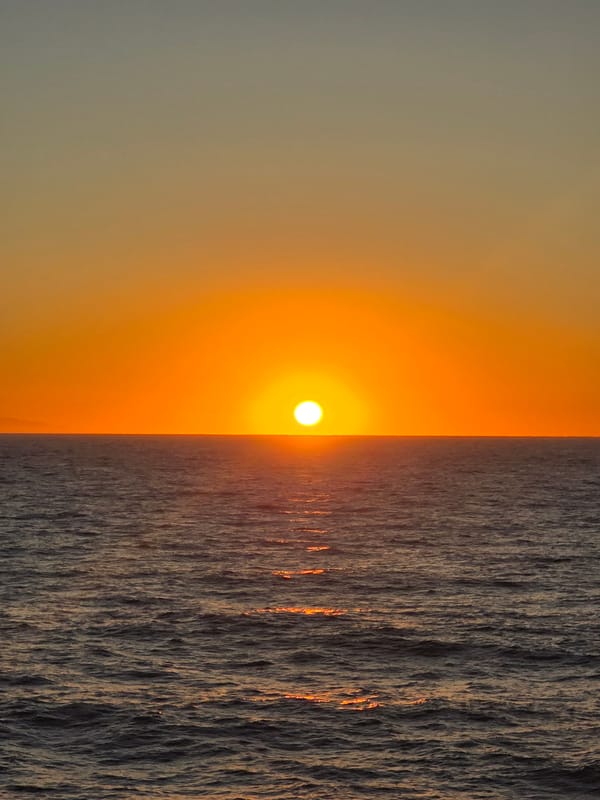 Ocean sunset documented in sequential photographs near Mediterranean coast