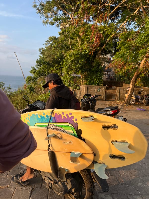 Surfboards, scooters, and a Bali sunset in Kuta Selatan