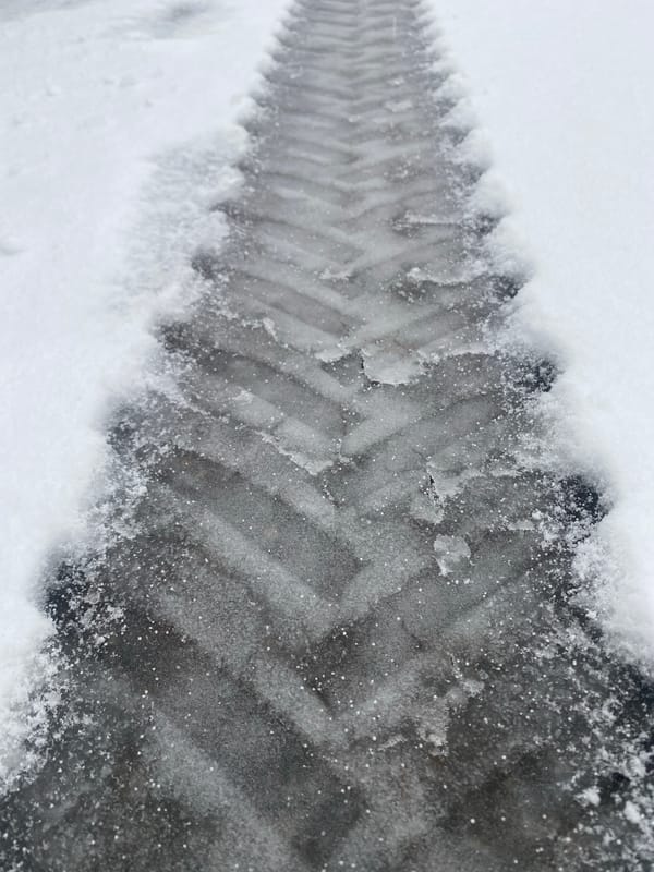 Snowy conditions documented in Prikamsky, Russia with damaged infrastructure