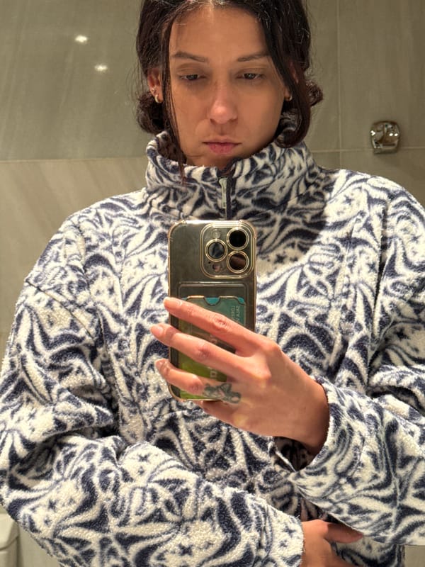 Woman takes bathroom selfie in Barcelona