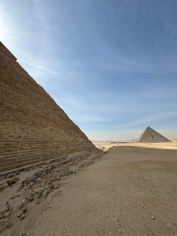 Tourist documents morning visit to Giza pyramids