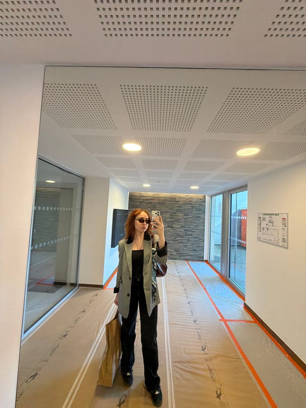 Woman Takes Selfies at Strasbourg Shopping Mall