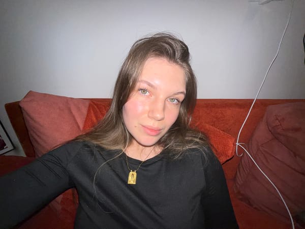 Woman rests while video editing documented in Belgrade suburb