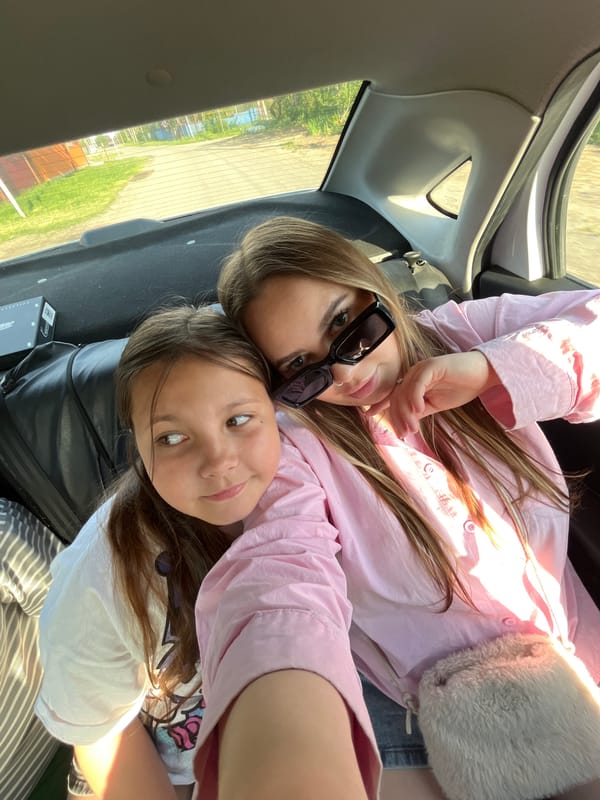 Two females photographed lying in car trunk in Russia