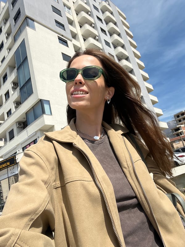 Woman poses for photo in Bar, Montenegro Friday morning