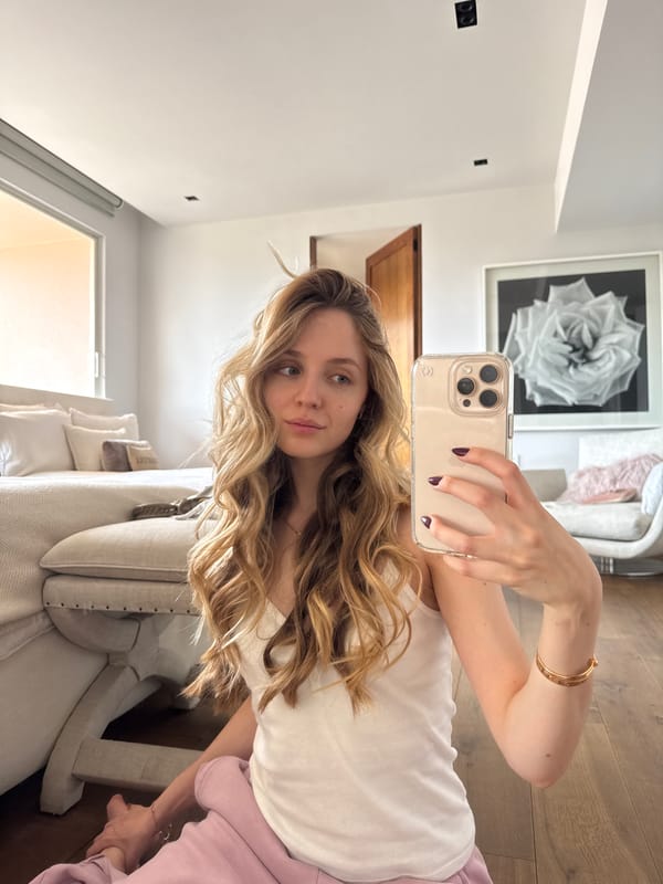 Woman takes selfies in modern Mexico City interior