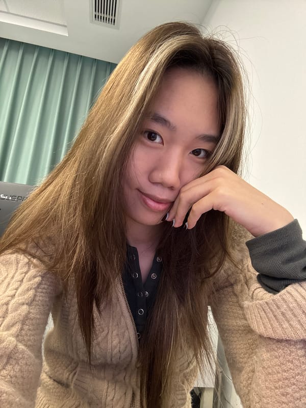 Student takes selfies in computer lab classroom