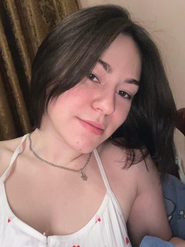 Woman's quiet evening moments with cat captured in Odesa