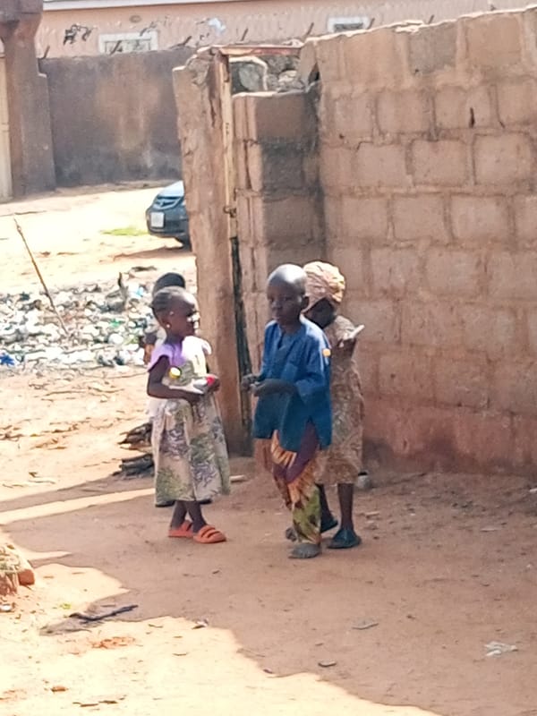 Kids in a dirt alleyway, Tempure, Nigeria