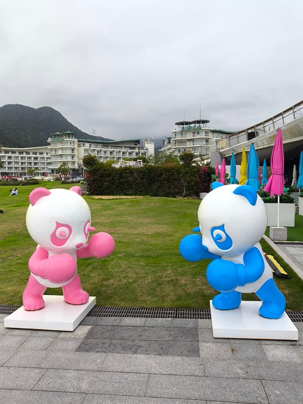 Outdoor art installations feature whale topiary and boxing pandas