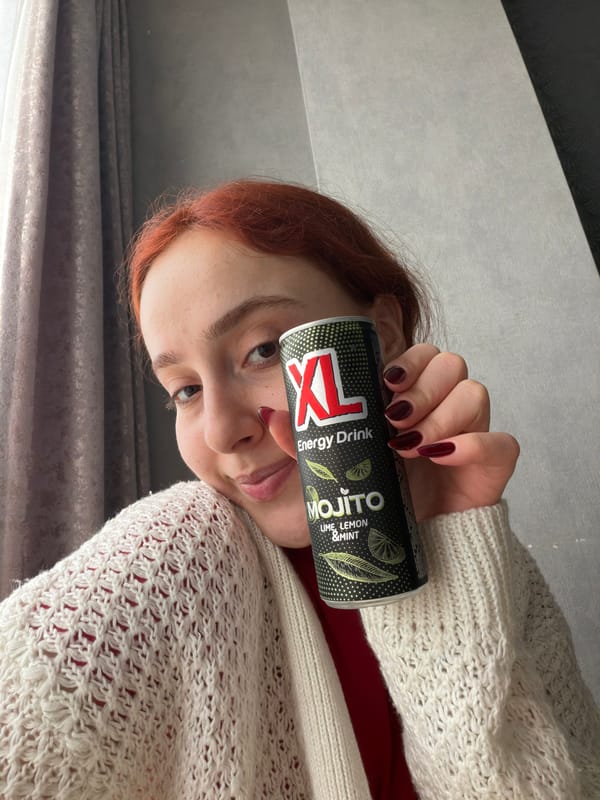 Woman photographed with energy drink in Tbilisi apartment