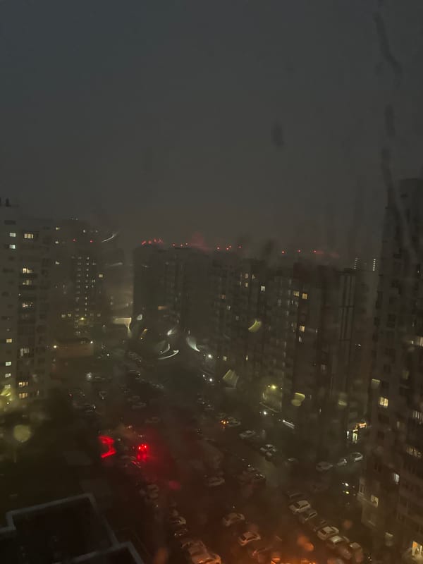Rainy night view through a window in Orenburg