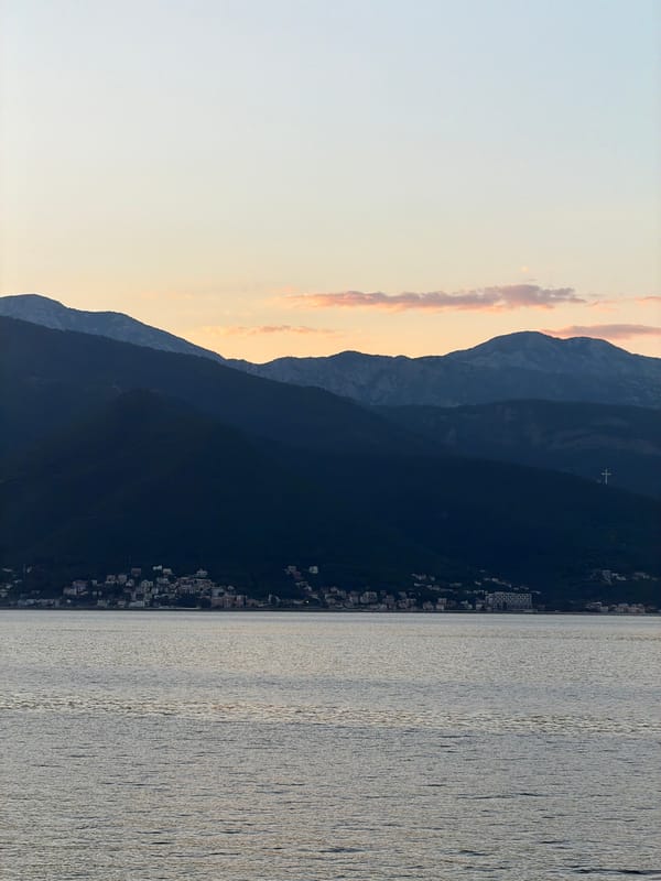 Sunset coastal views captured in Gošići, Montenegro terrace moment