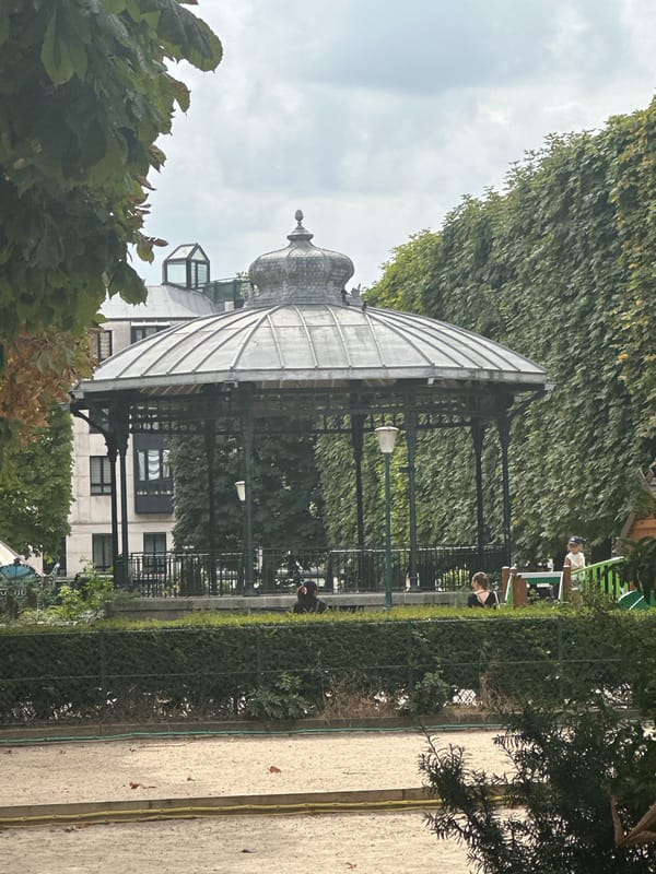 Paris residential streets and parkside architecture on a cloudy morning